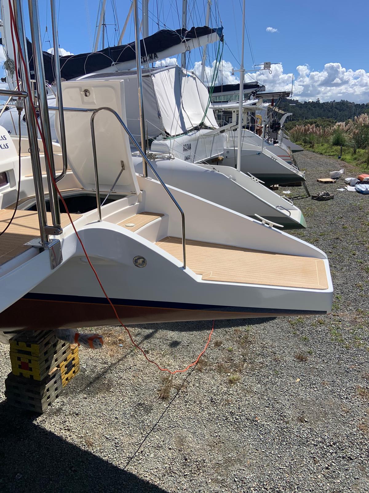 Catamaran swim platform with new decking