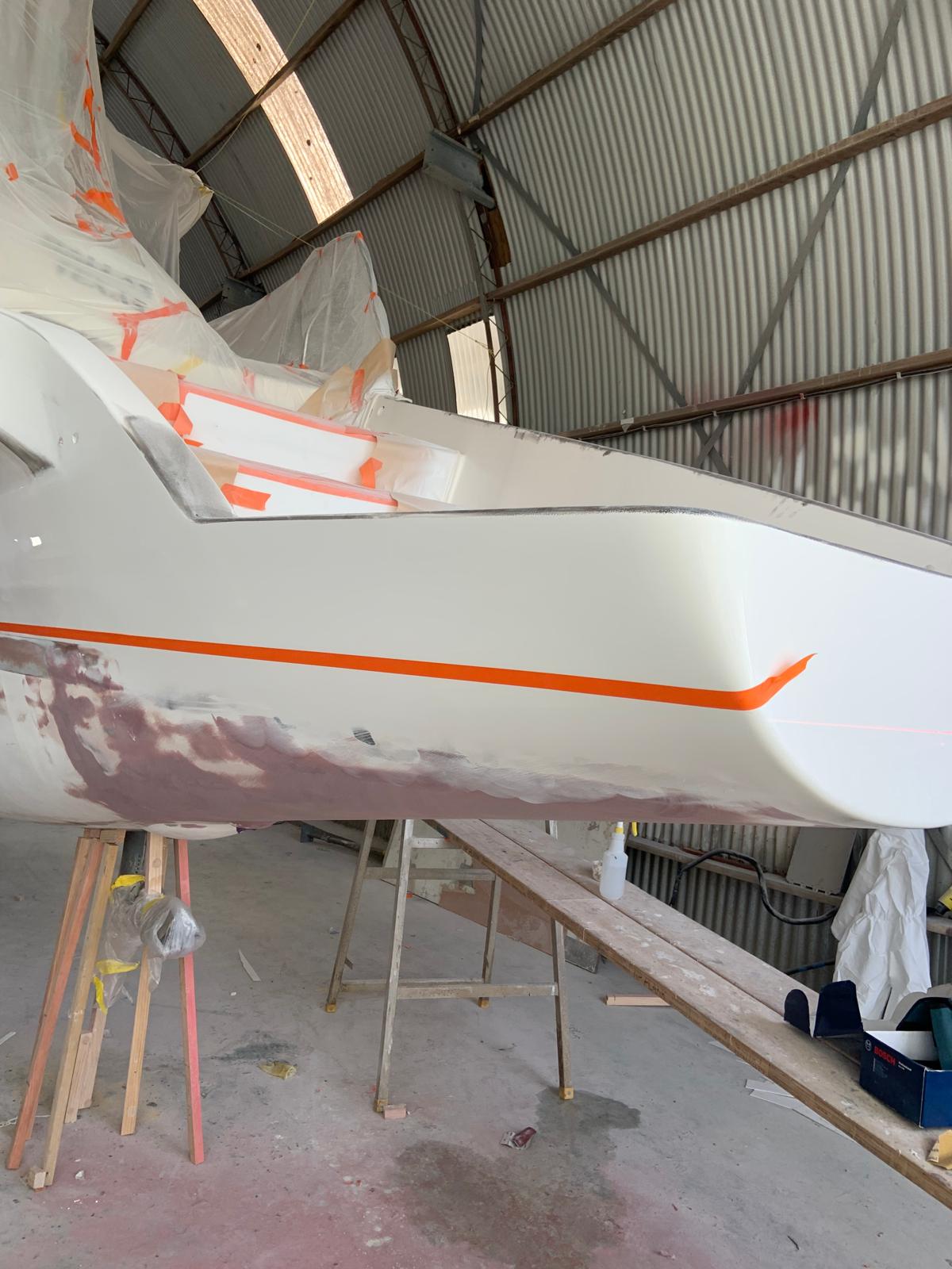 Boot stripe masked on a white hull